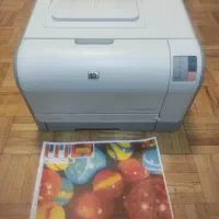 پرینتر لیزری رنگی مدل cp1217درحد نو  همراه با کابل