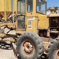 یک دستگاه گریدر کاترپیلار e140 ویکدستگاه غلطک هپکو