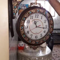 ساعت دیواری دو طرفه