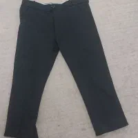 یک دست کت وشلوار تو عکس مشخص تن نشده