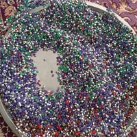 مقدار زیادی نگین ریز اتمی جنس لاک|جواهرات|اصفهان, باغ دریاچه|دیوار