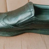 یک جفت کفش مردانه مشکی چرم