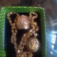 حدود ۱۶ گرم طلا