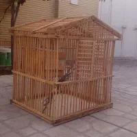 ققس‌ تمام چوبی بزرگ همراه با لونه