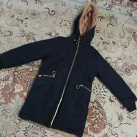 پوشاک|لباس|رباط‌کریم, کیکاور|دیوار