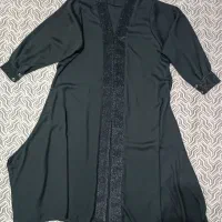تعدادی مانتو و پالتو زنانه و دخترانه