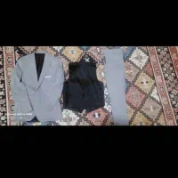کت وشلوار وجلیقه