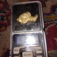 طلا و نقره اب شده.