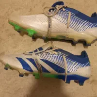 یک جفت کفش فوتبال استوک درشت|کیف، کفش، کمربند|بابل, |دیوار