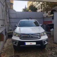 تویوتا هایلوکس ۲۰۱۶ اتومات دو کابین سفید بدون رنگ