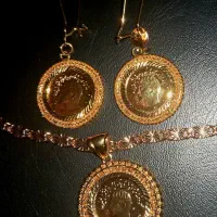 سرویس زنجیرشمایل وگوشواره نیم پهلوی شیرخورشید