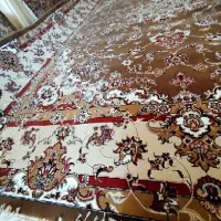 یک تخته فرش نو و آکبند و مقداری لوازم خانگی