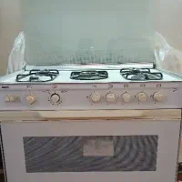 گاز فر دار  بسیار تمیز و میز تلوزیون