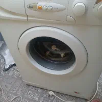 لباس شویی آبسال