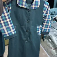 تولیدی لباف فرم مدارس|کفش و لباس بچه|مشهد, کوشش|دیوار