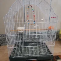 قفس پرنده با لانه و وسایل