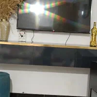 زیرتلوزیون دیواری جنس های گلس قیمت ۲۵۰۰