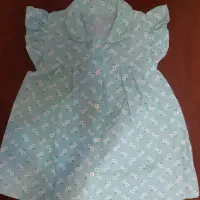 تعدادی لباس و کفش بچگانه|کفش و لباس بچه|بومهن, |دیوار