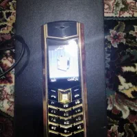 گوشی طرح ورتو طلایی بامالکیت