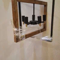 تعدادی لوستر چوب وفلز