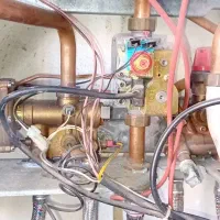 تاسیسات لوله کش فنر لوله بازکن تعمیر پکیچ آبگرمکن