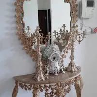 آینه و شمعدان به همراه ساعت رنگ استخوانی