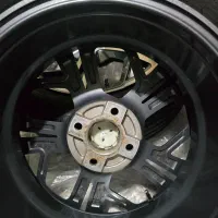 رینگکربن سایز ۱۶ دودی ورخ تراش با لاستیک چینی|قطعات یدکی و لوازم جانبی|عقدا, |دیوار