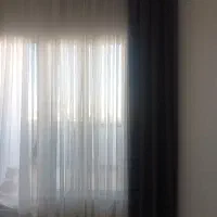 پرده پلیسه حریر ساده با والن رنگ طوسی