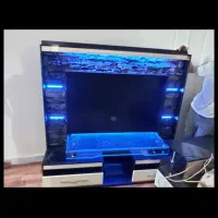 میز تلویزیون سالم و ترو وتمیز همراه با نورپردازی