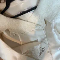 کت روی لباس عروس و عقد|لباس|شیراز, میرزاکوچک خان|دیوار