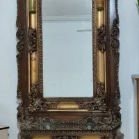 اینه و ساعت قدی