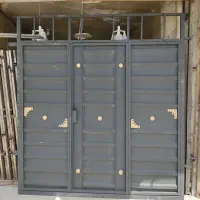 درب پارکینگ در ماشین رو درب بزرگ ماشینی تمام ورق