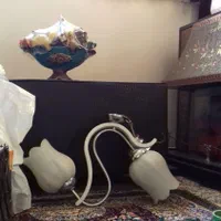 یک عدد لوستر دو شاخه جنس چوب و فلز در حد مدل غنچه