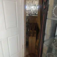 ساعت ایستاده و یک عددبوفه