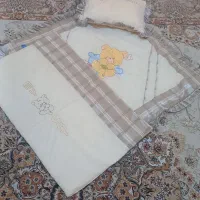 تشک و بالش و پتو نوزاد