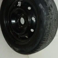 یک لاستیک درحد نو با رینگ مشهد