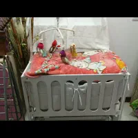 تخت کنار مادر نونو