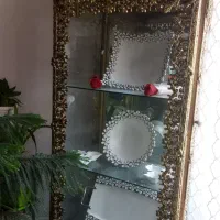 بوفه برنز وساعت ایستاده