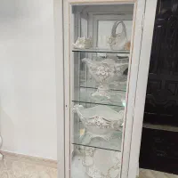 گنجه و ساعت ایستاده  و آینه کنسول