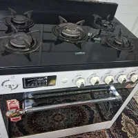 اجاق گاز پنج شعله صفحه شیشه‌ای سالم