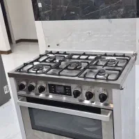 اجاق گاز پنج تمام استیل شعله فردار  جوجه گردان