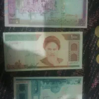 تعدادی سکه و پول کاغذی قدیمی