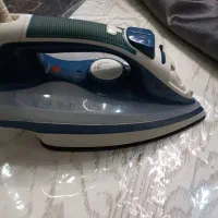 یک عدد اتوی بخار