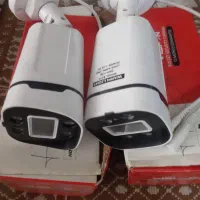 دو عدد دوربین مداربست به همراه لوازم