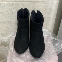 بوت|کیف، کفش، کمربند|رشت, فلسطین|دیوار