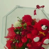 گل وعروسک برای تولد نوزاد