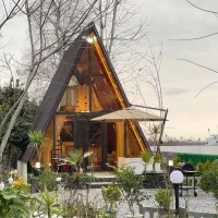 اجاره کلبه سویسی جکوزی شالیزار جنگلی