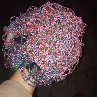 منجوق دوخته شده بر نخ نامریی