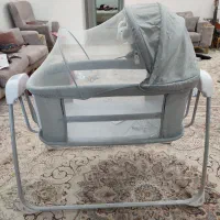 گهواره برقی موزیکال ماستلا و تخت کنار مادر