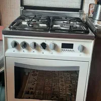 اجاق گاز ۴ شعله فردار جوجه گردان بفروش میرسد